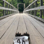 Owl's Head_Boots on Lincoln Woods Bridge