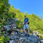 hiker on a rock slide area