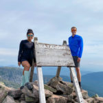 Standing with the famous Katahdin sign